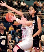 Shayla Scott defends against Oakland