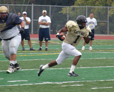 Justin King in mid-air on the first play for the Gator Offense - goes 80 yards for a TD