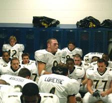 Team Captain Justin Colbaugh inspires the team at halftime