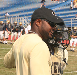 Head Coach Terry Smith talking to Charles King