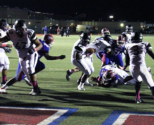 Gators top McKeesport 21-6 / Coach Smith wins 100th