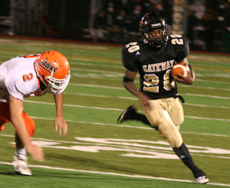 RB Cameron Saddler darts around the corner on his way to a big gain...